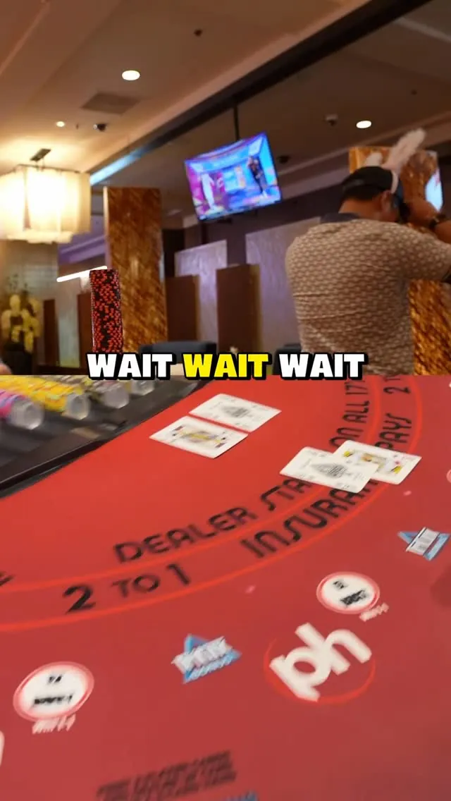 Cards on a red blackjack table in Thomas’s second Planet Hollywood video